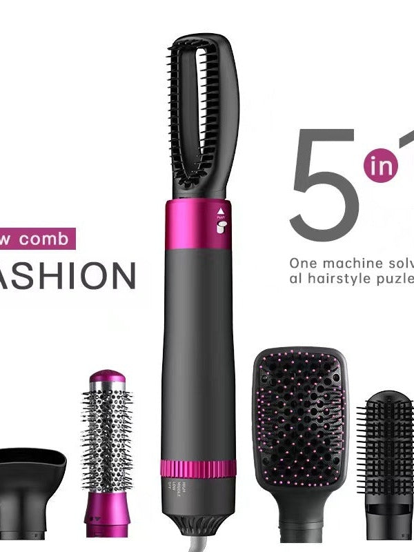 Upright grey and pink hair dryer brush with main round head and smaller attachment heads
