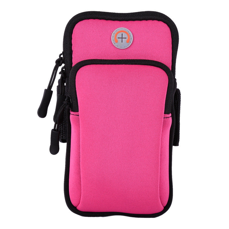Hot pink sports phone pouch with black trim and zippered front pocket