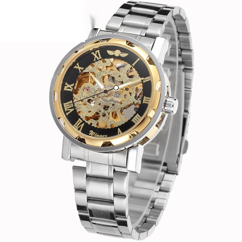 Mechanical skeleton watch with black dial and gold-toned gears, silver metal strap
