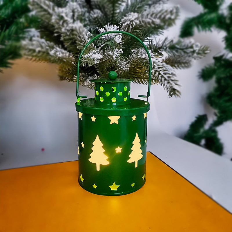 Green LED Christmas lantern candle with star and tree cutout pattern, arched handle