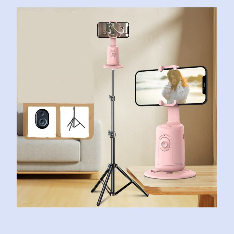 Pink 360 video stabilizer on base with phone mount and tripod stand.