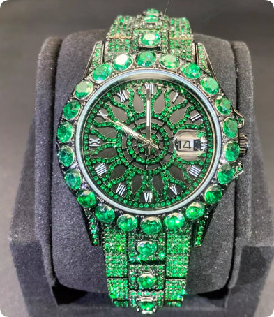 Diamond-encrusted wristwatch with green bezel, green dial, and crystal bracelet