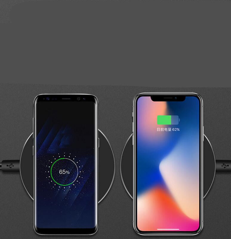 Black wireless charger with two phones shown side-by-side charging