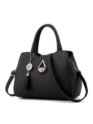 Black PU leather women's handbag with top handles, shoulder strap, tassel key charm