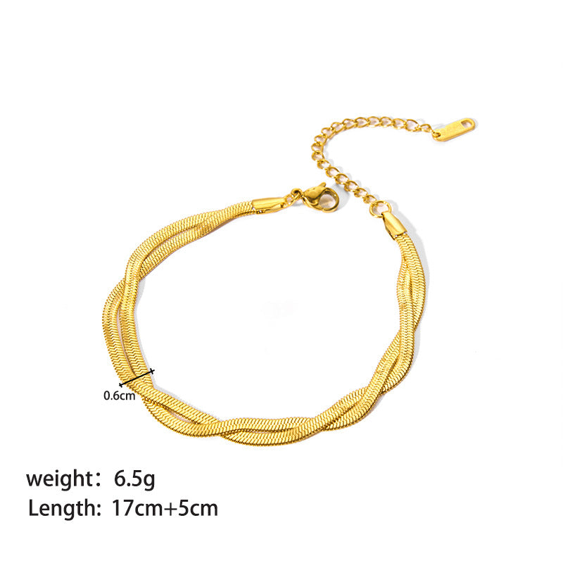 Gold-tone mesh ornament bracelet with curved center bar clasp
