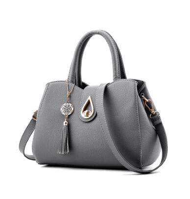 Grey PU leather women's handbag with top handles, shoulder strap, tassel key charm