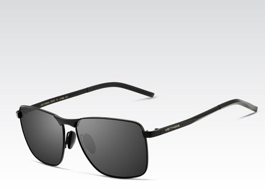 Black sunglasses with a visible brand logo on a light gray background