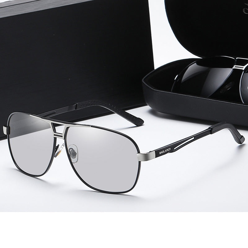 Polarized sunglasses with black frame and silver accents, gray lenses
