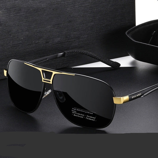 Black sunglasses with gold frames on a dark surface, text indicating high-definition polarized quality.