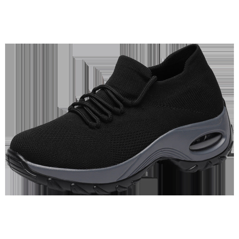 Black knit lace-up athletic shoes with gray sole and oval air window detail
