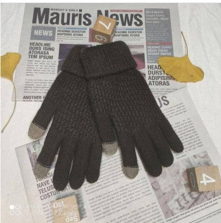 Dark gray knit jacquard gloves with ribbed cuffs and geometric pattern