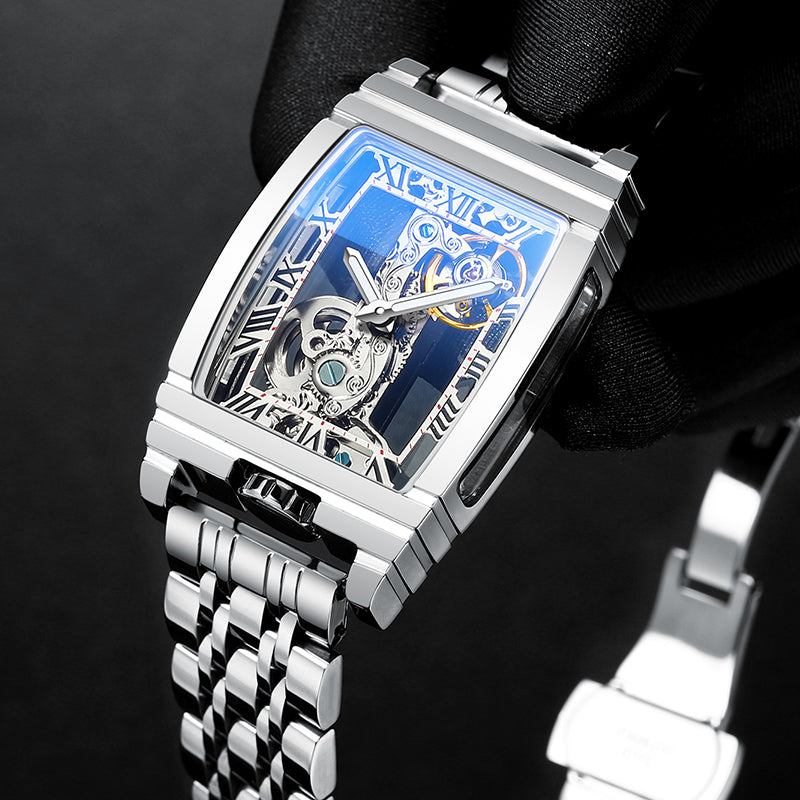 Silver skeleton mechanical watch with metal bracelet and blue openwork dial