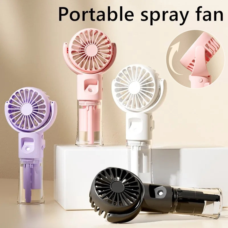 Assorted spray fans in pink, white, purple, and black with mist sprayer pieces