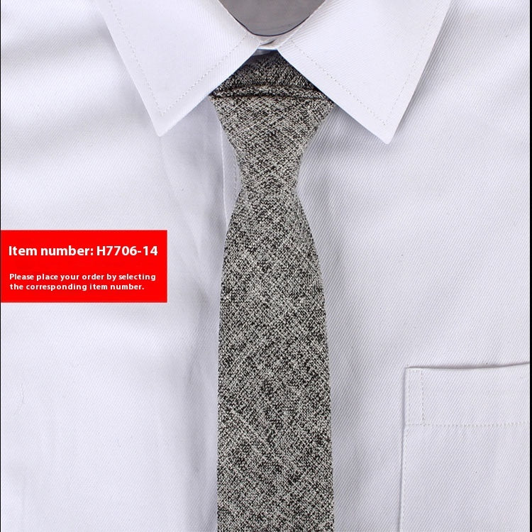 Narrow cotton tie in medium gray speckled textured weave
