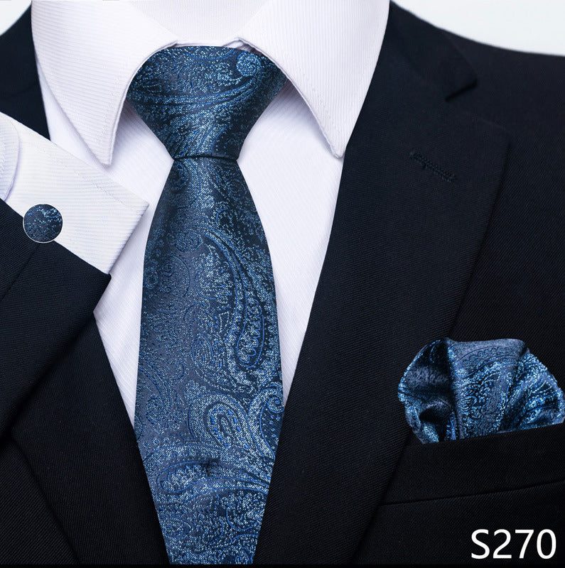 Men's formal tie, pocket square, and cufflink set with dark blue paisley-style tie
