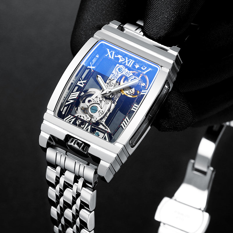 Silver skeleton mechanical watch with metal bracelet and blue openwork dial