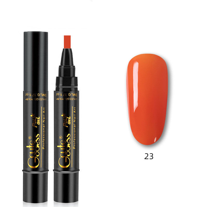 Orange nail glue pen with applicator tip and orange nail swatch, shade 23