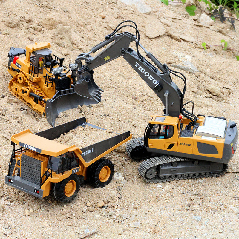 Yellow remote-control excavator toy with bucket and articulated boom on tracks