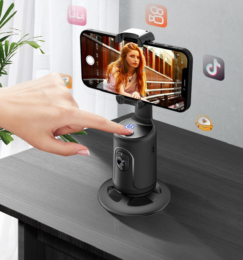Black AI phone holder on tabletop with smartphone mounted horizontally