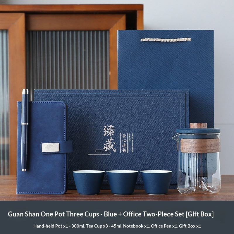 Blue office gift set with notebook, pen, and dark blue tea cups plus tea pot tumbler