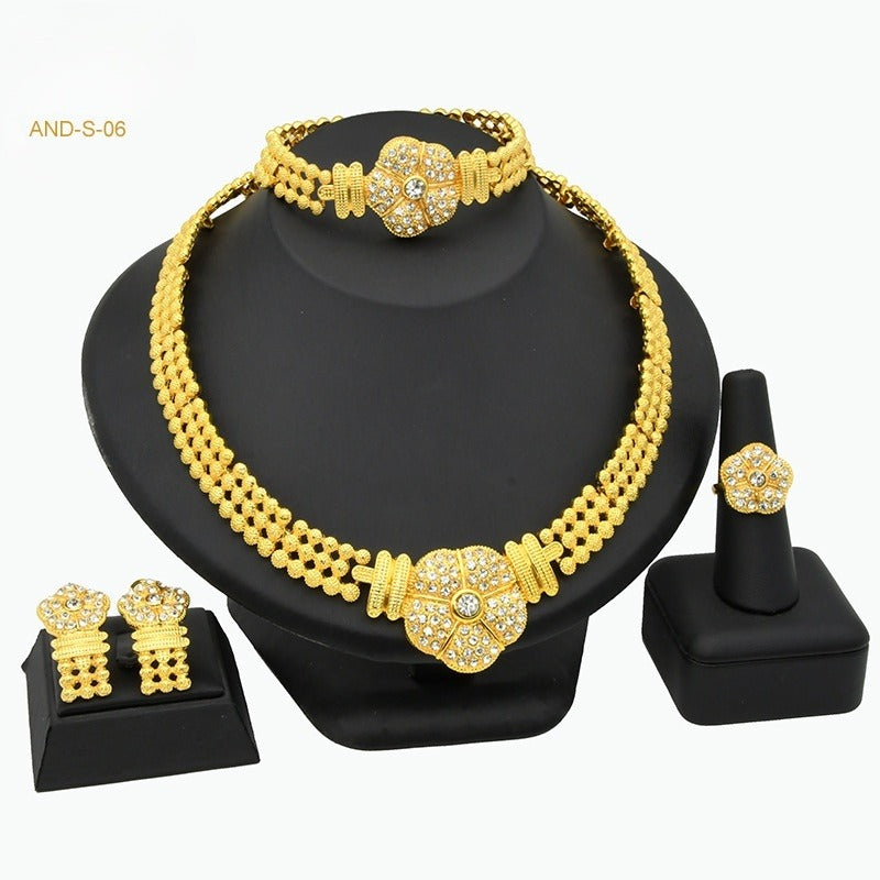 Gold-plated beaded necklace set with matching bracelet and stud earrings plus ring