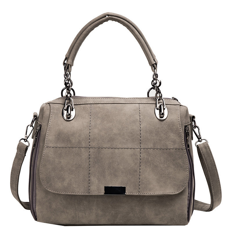 Women’s shoulder matte bag, grey with quilted front flap and silver chain handles