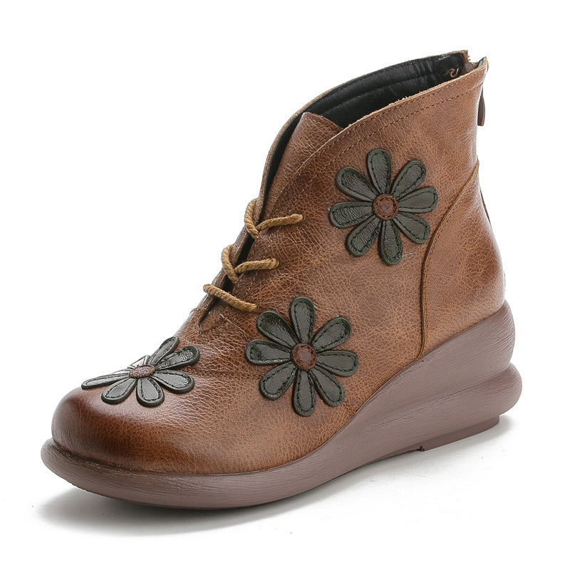 Brown mid-top leather ankle boot with lace-up and green flower embroidery