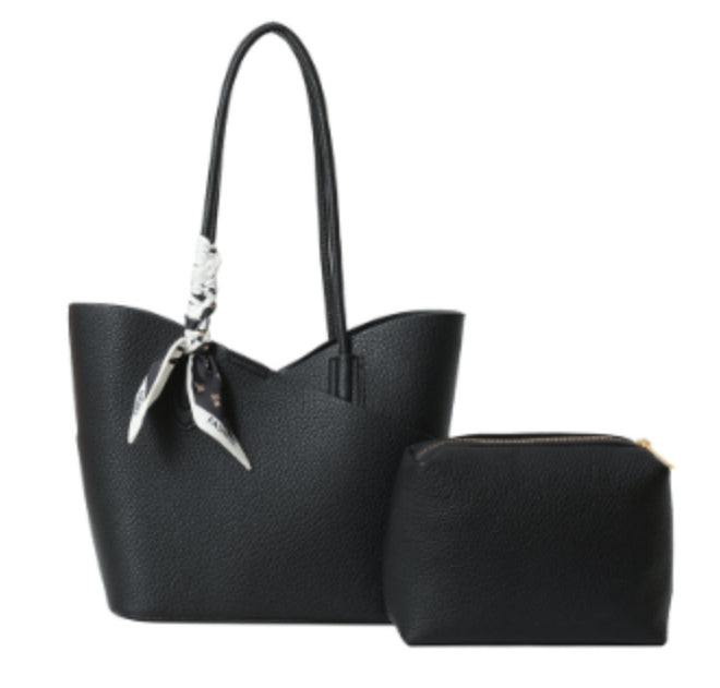 Black shoulder tote handbag with hanging bow charm and zip pouch
