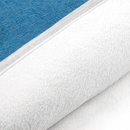 Close-up of a blue and white textured fabric