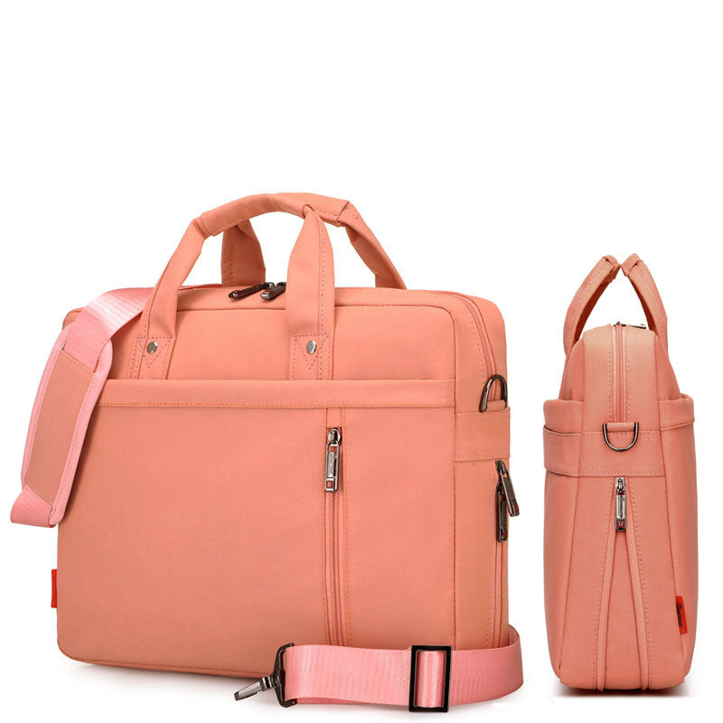 Coral pink waterproof laptop bag with front zipper pocket, top handles, and crossbody strap