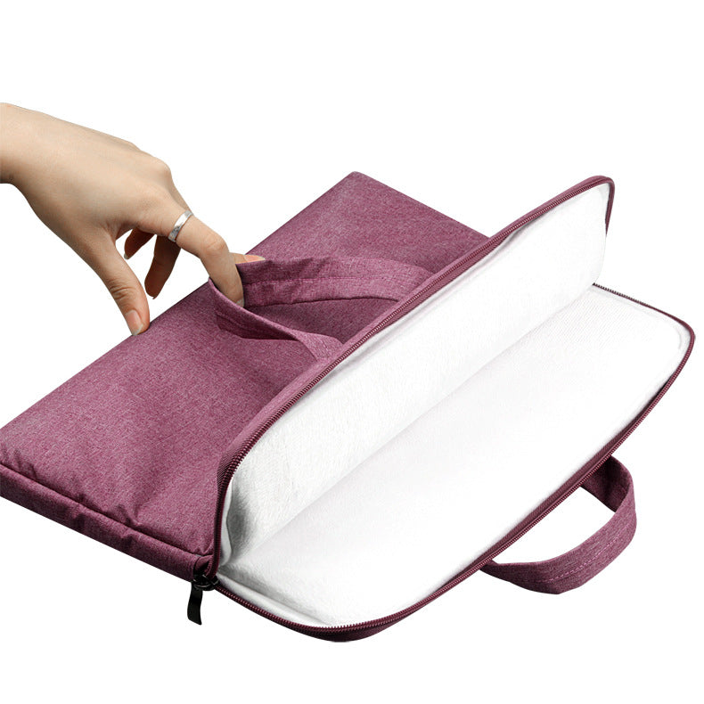 Rose red laptop bag open with padded inner sleeves and divider