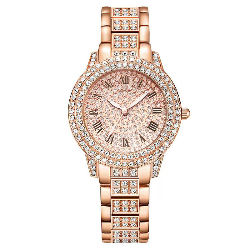 Women’s crystal wristwatch with rose-gold tone, jeweled bezel and matching link bracelet