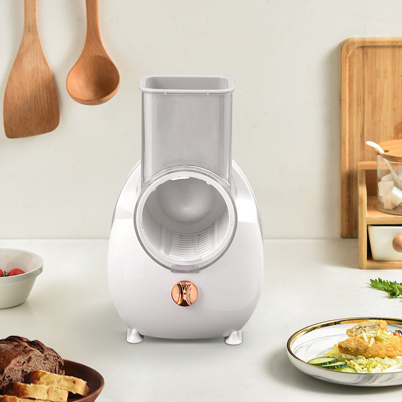 White electric vegetable slicer and grater with transparent feeder and countertop-ready base