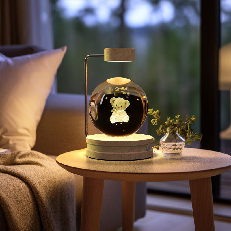Cosmic LED night light with glowing teddy bear figure inside crystal globe