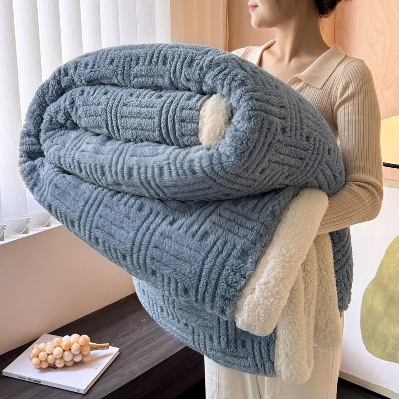 Slate blue plush velvet winter blanket with textured stripes and soft light sherpa border