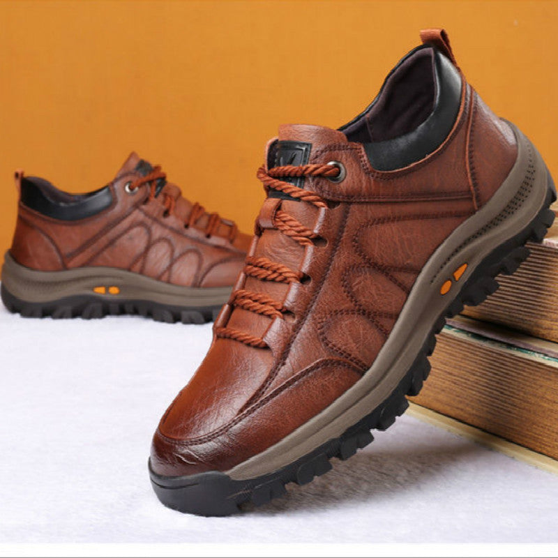 Men's leather hiking shoes in brown and black, lace-up sneakers with chunky rubber soles