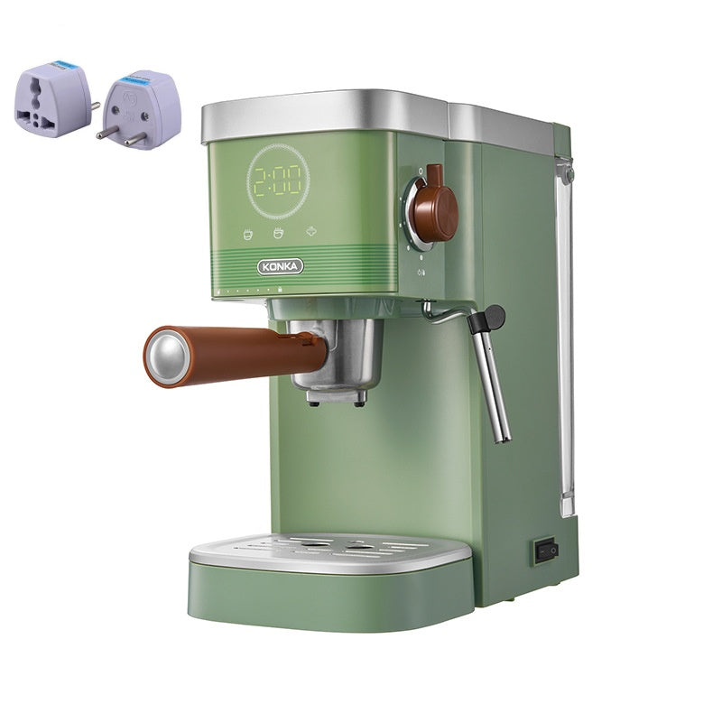 Green countertop coffee maker with copper-brown front knob, brew spout, and plug icons