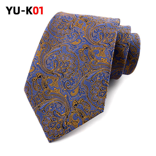 Blue and gold paisley patterned tie on a white background