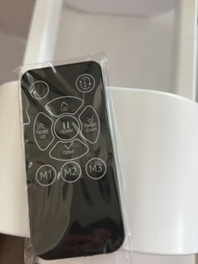 Black remote control with button layout for humidifier settings