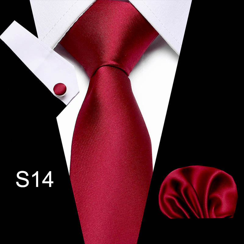 Men's business tie in solid deep red with a smooth textured weave