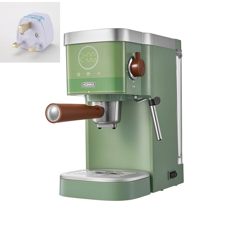 Green countertop coffee maker with brew spout, copper-brown knob, and included outlet plug icons