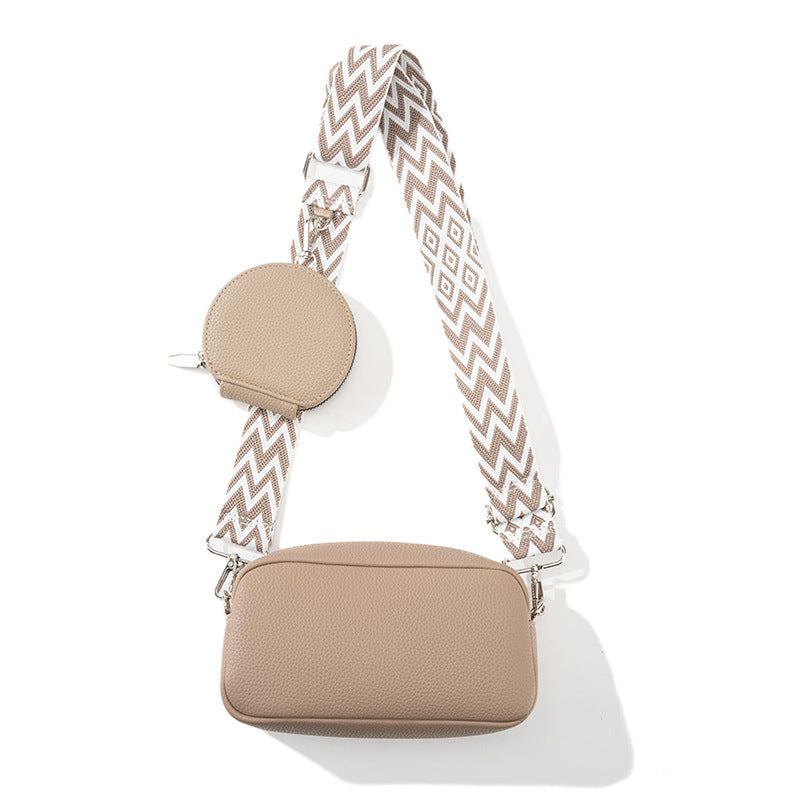 Women's casual crossbody bag in beige with round zip pocket and patterned chevron strap