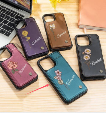 Floral mobile phone cases in purple and teal with daisy prints and camera openings.