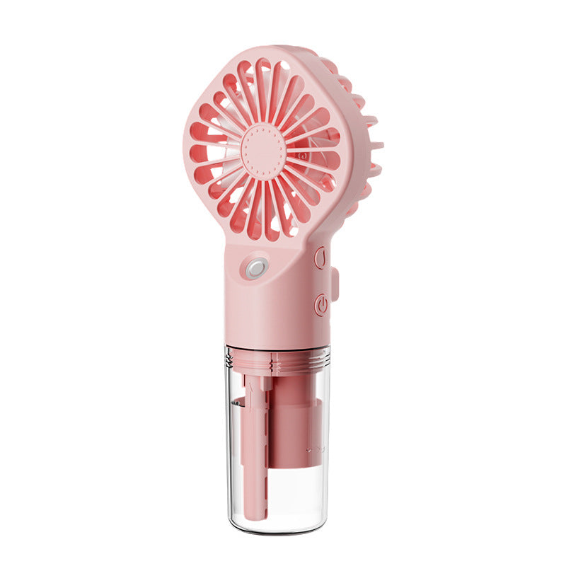 Portable 4-speed handheld fan in pink with clear base cup and circular vent grill