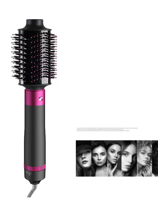 Round barrel hair dryer brush head with mixed bristles on a grey and pink handle