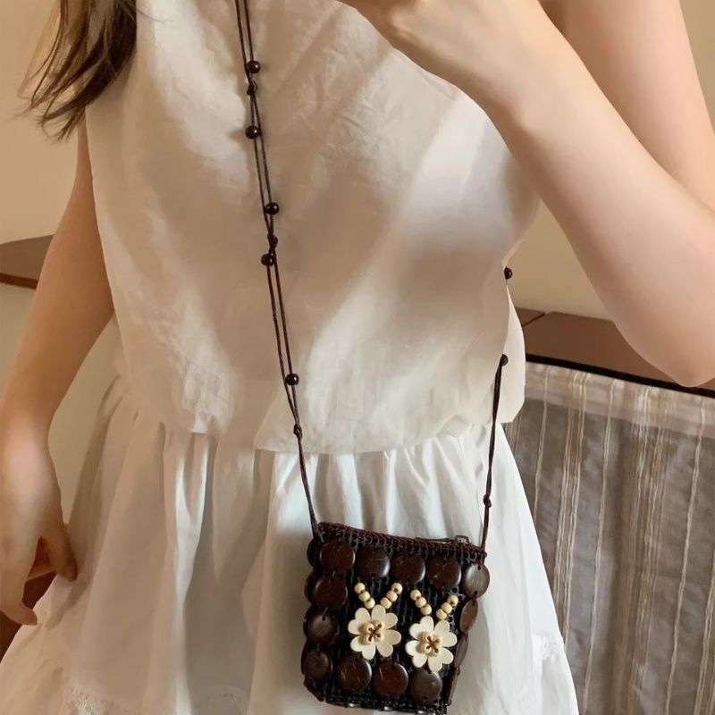 Handmade woven crossbody bag, dark brown round with white flower appliques and bead trim
