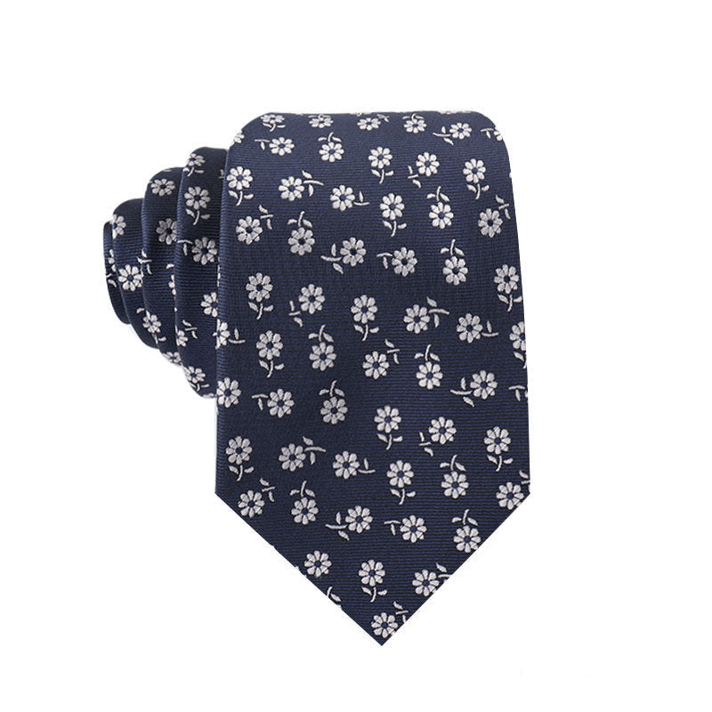 Men's necktie with navy base and white daisy floral pattern