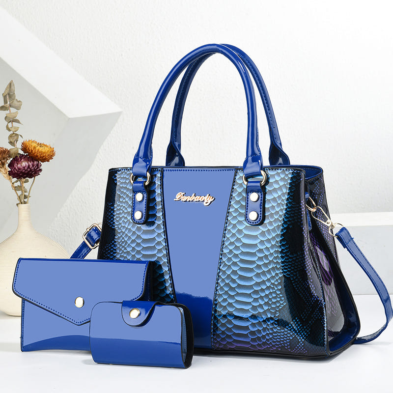 Blue shoulder tote bag set with scalloped texture, front pocket, and wallet
