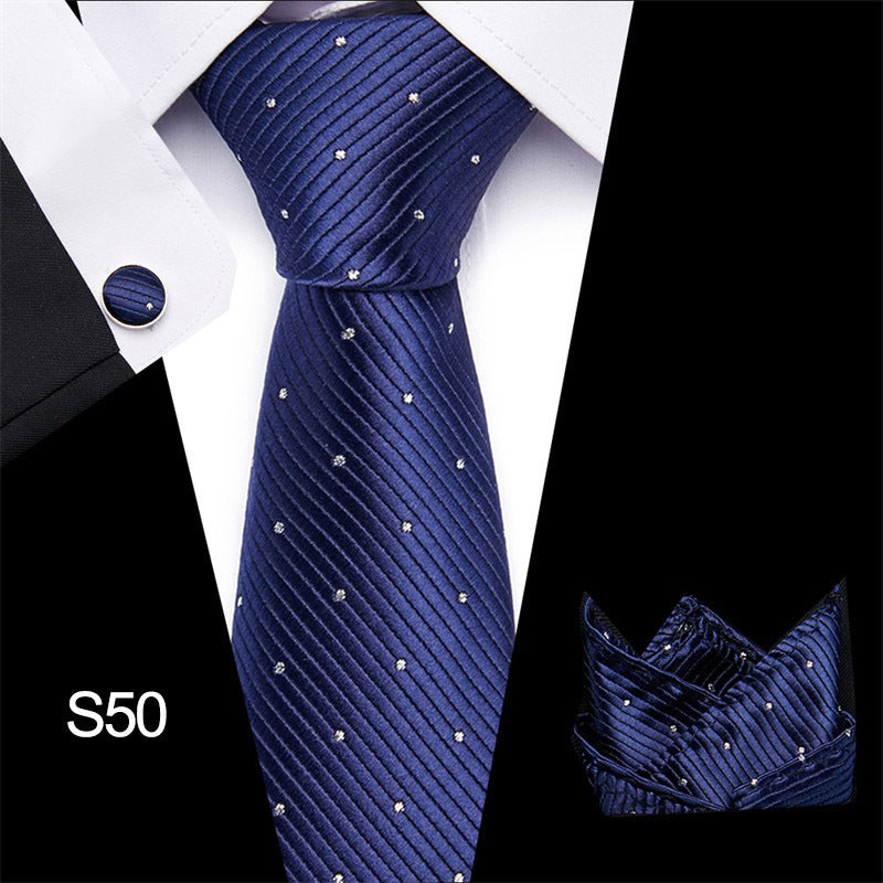 Men's business necktie, deep blue with tiny dotted pattern and subtle texture