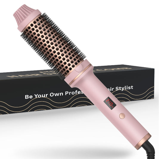 Pink hair styling tool with black bristle brush head on a white background